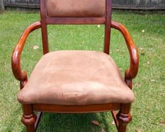 Lot Number:	67
Lead:	Wood Office Chair w/ Straight Back
Description:	on rollers; not reclining; 2 small holes in upholstery 38.5" tall at back; seat 18.5" tall; 20" wide at front