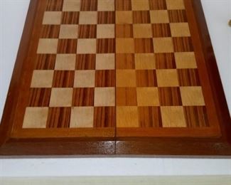 Lot Number:	76
Lead:	Vintage Wooden Chess Board w/ Case
Description:	case 16" by 8" ***wooden chess pieces are not a complete set