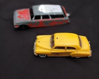 Lot Number:	89
Lead:	Vintage Tootsie Ford & Checker Cab
Description:	- yellow Checker Cab Taxi (missing top sign); 4.5" long; Made in France - Tootsie Ford diecast station wagon (missing rear wheels); Chicago 24 USA; 5.5" long