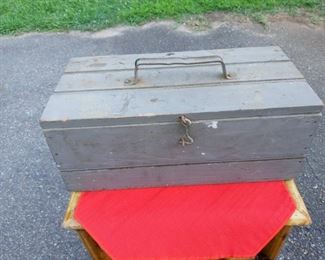 Lot Number:	134
Lead:	Small Handmade Gray Tool Box
Description:	wood; beveled slats on top 14" by 7" by 6"