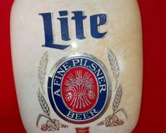 Lot Number:	149
Lead:	Miller Lite Wall Beer Sign 1980
Description:	" A Fine Pilsner" hard plastic " bubble" shape; No. 57-27650 hairline crack at left hand side & at bottom 18.5" by 14.5" by 3" deep