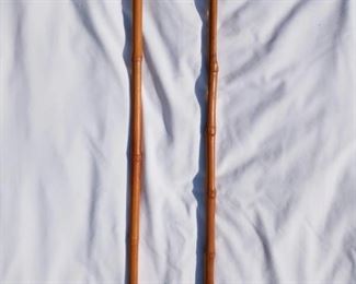 Lot Number:	175
Lead:	2 Vintage Bamboo Wood Canes
Description:	round top- 35" reddish handle top- 35.5"
