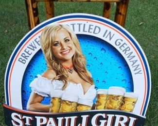 Lot Number:	180
Lead:	St. Pauli Girl Beer Sign
Description:	metal; trademark Anheuser-Busch 2012 24" by 20"