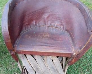 Lot Number:	183
Lead:	Hand-Made Native American Chair
Description:	unusual; rounded back frame made from wood limbs and hand tied no design