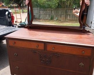 Lot Number:	192
Lead:	Mid-Century Dresser w/ Mirror
Description:	4 drawers; fancy applied carving; brass pulls bigger than usual- 48" by 34.5" by 20"
