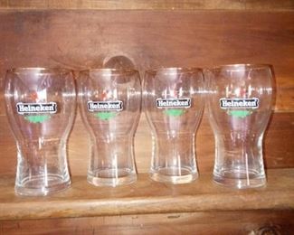 Lot Number:	198
Lead:	Four Small Heineken Beer Glasses
Description:	"tasting" glasses; gold rim 5" tall