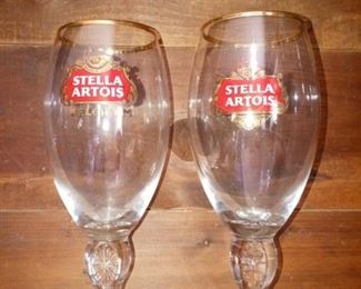 Lot Number:	199
Lead:	Stella Artois Beer Glasses
Description:	2 total; Belgium beer; glasses are not exactly the same 8" tall