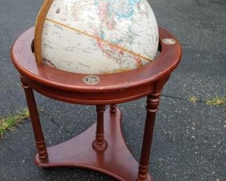 Lot Number:	205
Lead:	World Globe on Wooden Stand
Description:	16", Replogle World Classic Series; metal arc holder about 32" tall by 22" diameter; spins fine