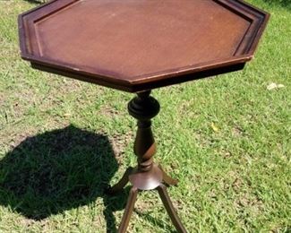 Lot Number:	215
Lead:	Unusual Vintage Octagonal Top Stand
Description:	metal pedestal base legs with wood top 27.5" tall by 18.5" diameter
