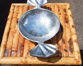 Lot Number:	224
Lead:	Fancy Aluminum Serving Dish
Description:	India; handles like fins; etched bottom 13" wide by 7.5" diameter by 2" deep (bowl)