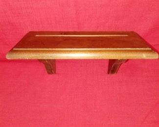 Lot Number:	228
Lead:	Vintage Small Wood Wall Shelf
Description:	has groove for plate; beveled edges 12' wide by 5.5" wide