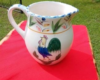 Lot Number:	229
Lead:	Ceramic Water Pitcher w/ Rooster Design
Description:	glazed; unmarked 6.25" tall by 4.75" diameter at top
