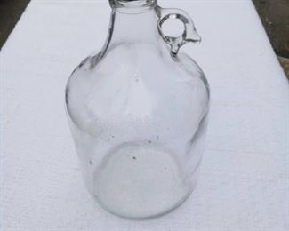 Lot Number:	236
Lead:	Vintage Glass Gallon Jug
Description:	Cap says " Unscrew With Constand Upward Pressure" on bottom: DEC PAT 194991
