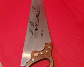 Lot Number:	251
Lead:	Vintage Sears Craftsman Hand Saw- 26"
Description:	wheat design on handle; Sear's Best; Made USA