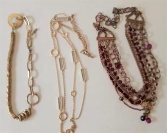 
Lot Number:	280
Lead:	Necklace Lot
Description:	3 total "gold" beads- 20" long w/ silver rectangles- 36" long purple beads-26" long

