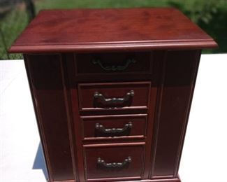 Lot Number:	284
Lead:	Wooden Jewelry Box
Description:	11" tall by 9.5" by 6" top & sides open; 3 drawers