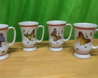 Lot Number:	302
Lead:	Butterfly Mugs
Description:	set of 4- design on both sides; 5" tall