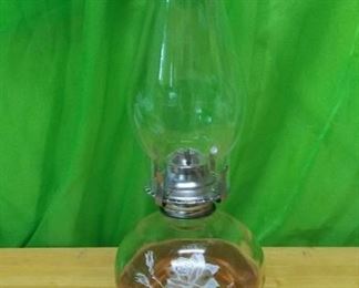 Lot Number:	304
Lead:	Oil Lamp w/ Globe
Description:	white rose design on front; Farm's Lamp Light 16" tall including globe
