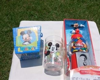 Lot Number:	311
Lead:	Disney Mickey Mouse Collectibles Lot 2- new items
Description:	Mickey gumball machine, small storage box, & smal drink cup
