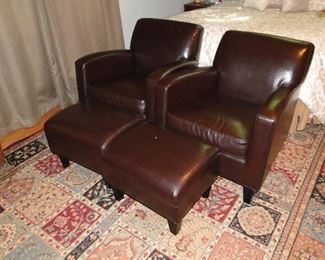 Pleather club chairs with ottomans