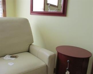 It's a near perfect cream leather Barca Lounger and a few red treasures