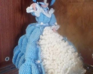 Vintage doll with blue crochet dress