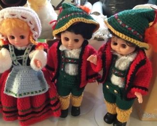 3 German dolls with crochet outfits and stands