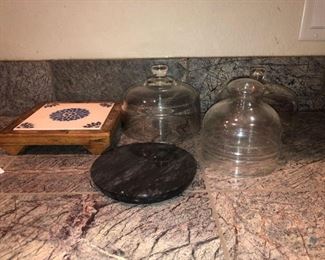 Glass Cloches and Trivets
Three (3) cloches and two (2) trivets - one is marble. No apparent chips or cracks.