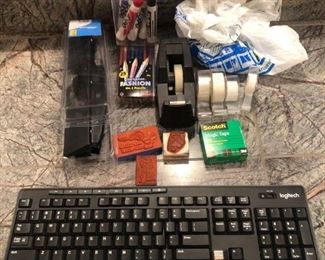 Office Supplies
Includes a hole-punch, dry-erase markers, rubber stamps and lots of clear tape.