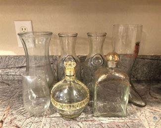 More Glasses!
Two (2) empty liquor bottles with gilding, two (2) carafes and a vase and pitcher. No apparent chips or cracks.