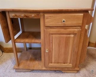 Bar Cart
Wood Rolling Bar Cart. 34"Hx40"Wx20"D, with top extended 51"wide.