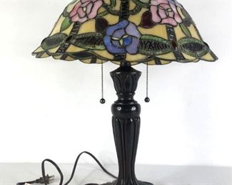 Tiffany Style Lamp
Lamp with resin base and floral shade. Measures 24"Hx 16"W. Powers On. Matches Lot 379