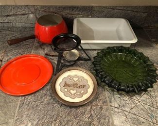 Vintage Fondue Pot
Orange fondue pot, cooking pan, and more