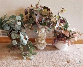 Faux Plants
Two (2) faux plants in decorative statue and vase. One is in a wire plant holder. 20"T and 25"T