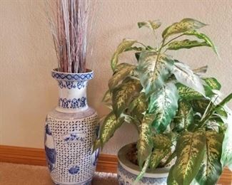 Chinese Pottery with Foliage
Blue and white Chinese pottery. Measure 25"H and 10"H without foliage.