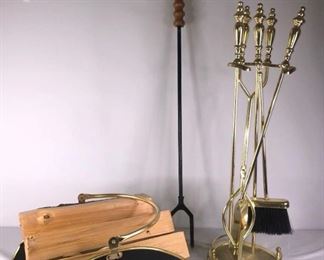 Fireplace Accessories
Brass colored poker set and brass and black firewood holder