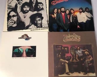 The Doobie Brothers Records
One (1) "Toulouse Street", one (1) "Takin' it to the streets", one (1) "One Step Closer", and one (1) "Minute By Minute" by the Doobie Brothers. All in good condition.