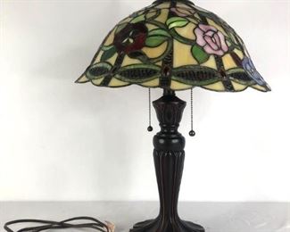Tiffany Style Lamp
Tiffany style lamp with resin base and floral shade. 26"Hx16"W. Powers On. Matches Lot 300
