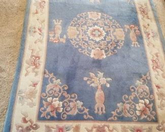 Blue Throw Rug
Blue and pink colors. Needs cleaning. 4'x6'.