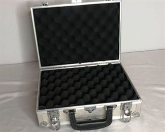 Firearms Case
TRIKON metal, foam lined firearms case. 9.5"Hx13"Wx5"D