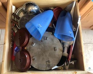 Assorted Kitchen Tools and More
Drawer of assorted kitchen utensils and tools including oven mitts, cheese-grater, chopper, tongs and more. Used condition.