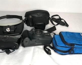Vintage Cameras
Three (3) cameras - two (2) Pentax and one (1) Canon. Condition unknown. Also includes a head lamp and two (2) carrying cases.