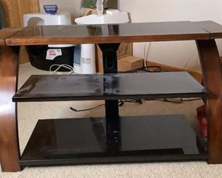 TV Stand
24"Wx44"Wx15"D. Wooden and Glass
