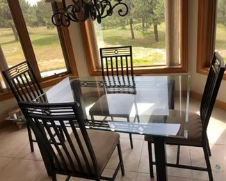 Metal and Glass Top Dining Table
Small dining/kitchen table and four (4) chairs with suede-like upholstery. Table - 30"Hx60"Wx42"D; Chairs - 42"Hx19"Wx20"D