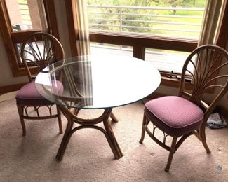 Rattan Table & Chairs
Includes one Ratan table with round glass top approx. 27" tall with approx. 42" diameter glass table top. Also included are two (2) matching chairs approx. 37: x 21" x 17".