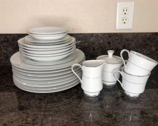 Royal M Silver Painted and White China
Royal M Silver Painted and White China. Two (2) cups, one (1) sugar dish, one (1) creamer, eight (8) dinner plates and more. Very damaged, has lots of chips and cracks.
