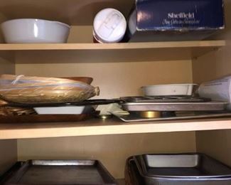 Assorted Kitchen Items
Includes cookie sheets, cupcake tins, wooden trays, and more.