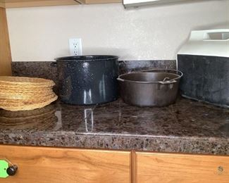 Camping Cookware
One (1) Igloo Cooler, One (1) Cast Iron Pot, One(1) metal pot, nine (9) basket paper plate holders.