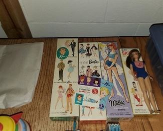 Vintage Barbie, Midge, Skutter, Ken dolls in original boxes.  