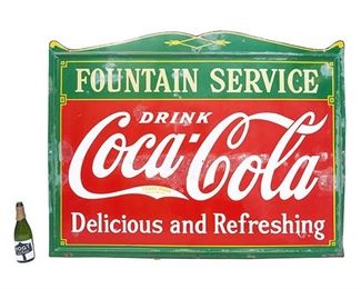 Coca-Cola enameled metal advertising sign, "fountain service", "delicious and refreshing", arched top, single sided
45.5"h x 60.5"w